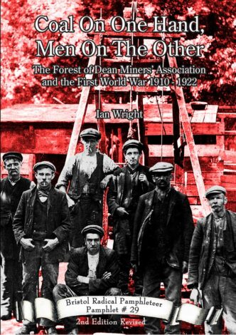 Front cover, group shot miners in front on a mine head