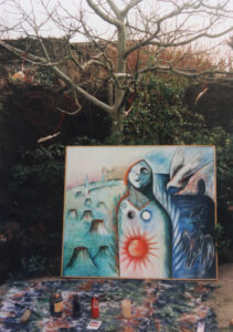 Canvas of Monica Sjöö painting "Mother Earth in Pain" with tree in background